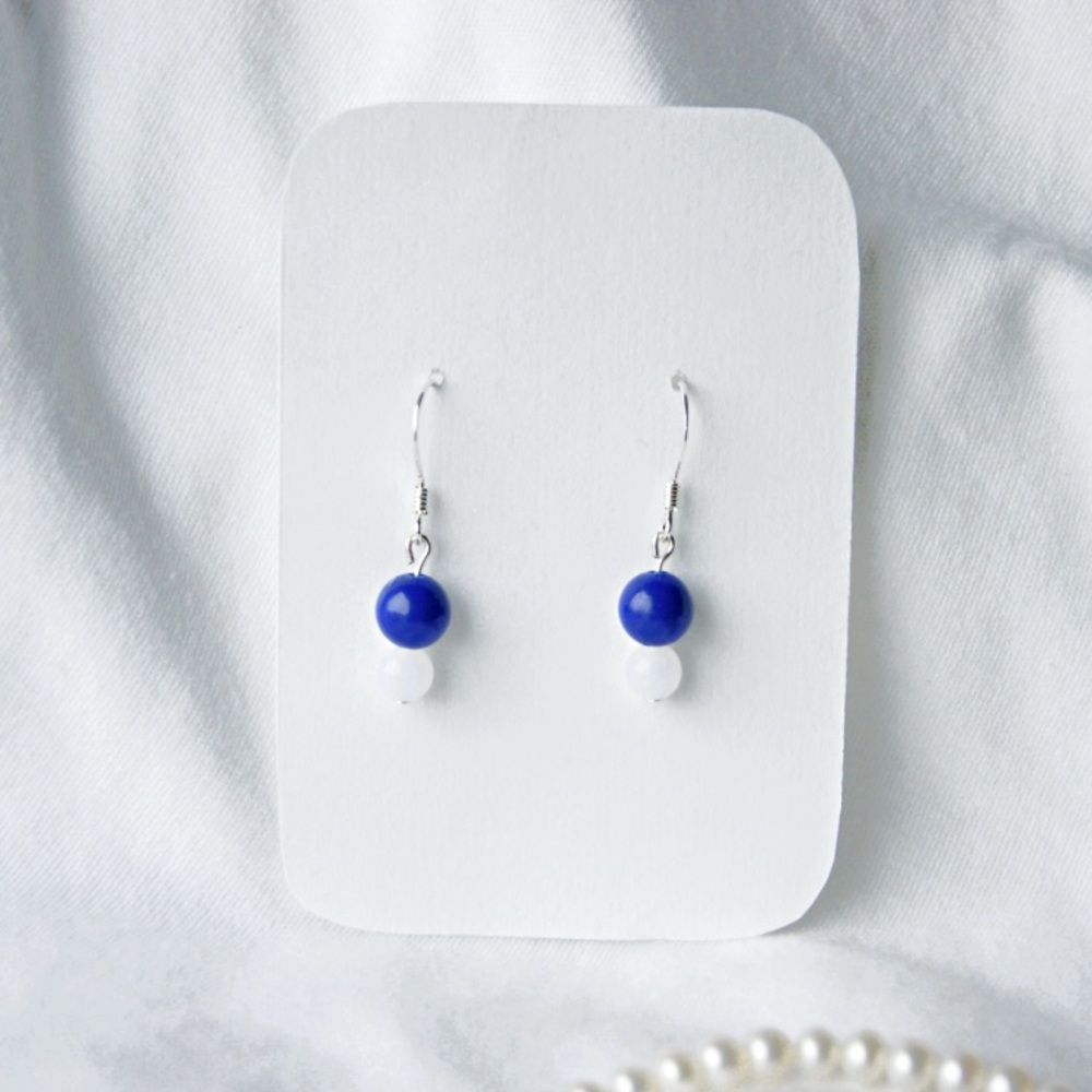 White and blue beaded dangle earrings